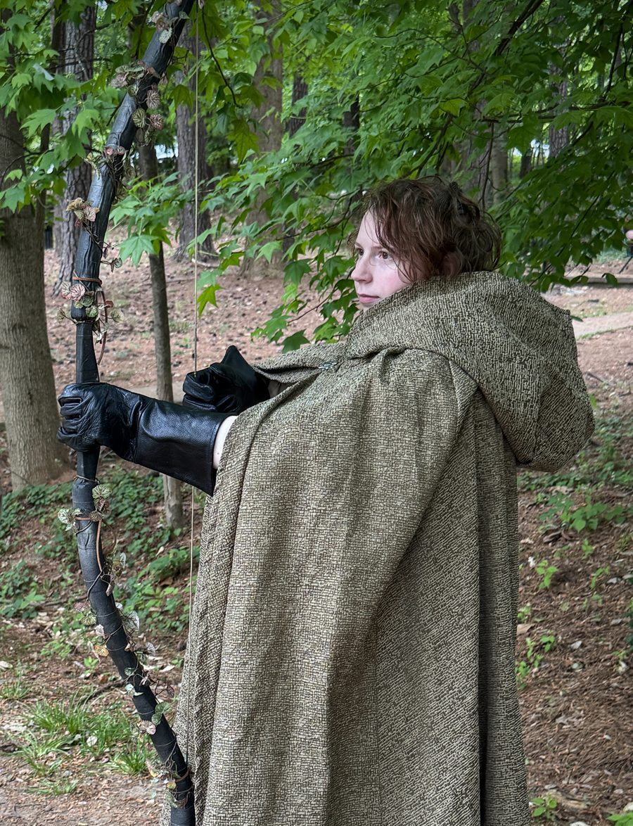 Archer in green cloak